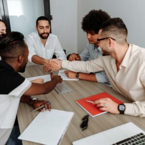 Group Of People Shaking Hands